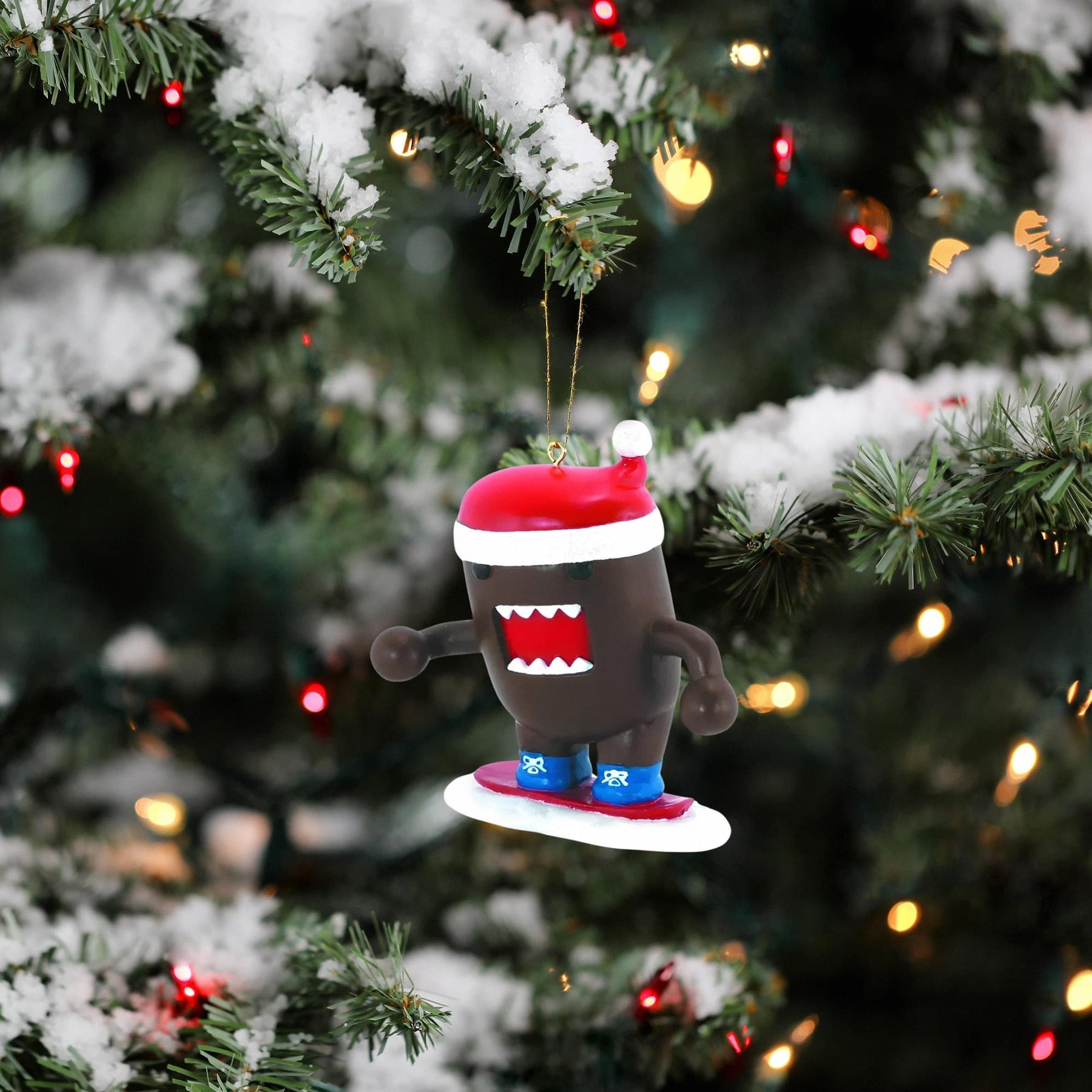 Domo Holiday Ornament: Snowboarding Domo