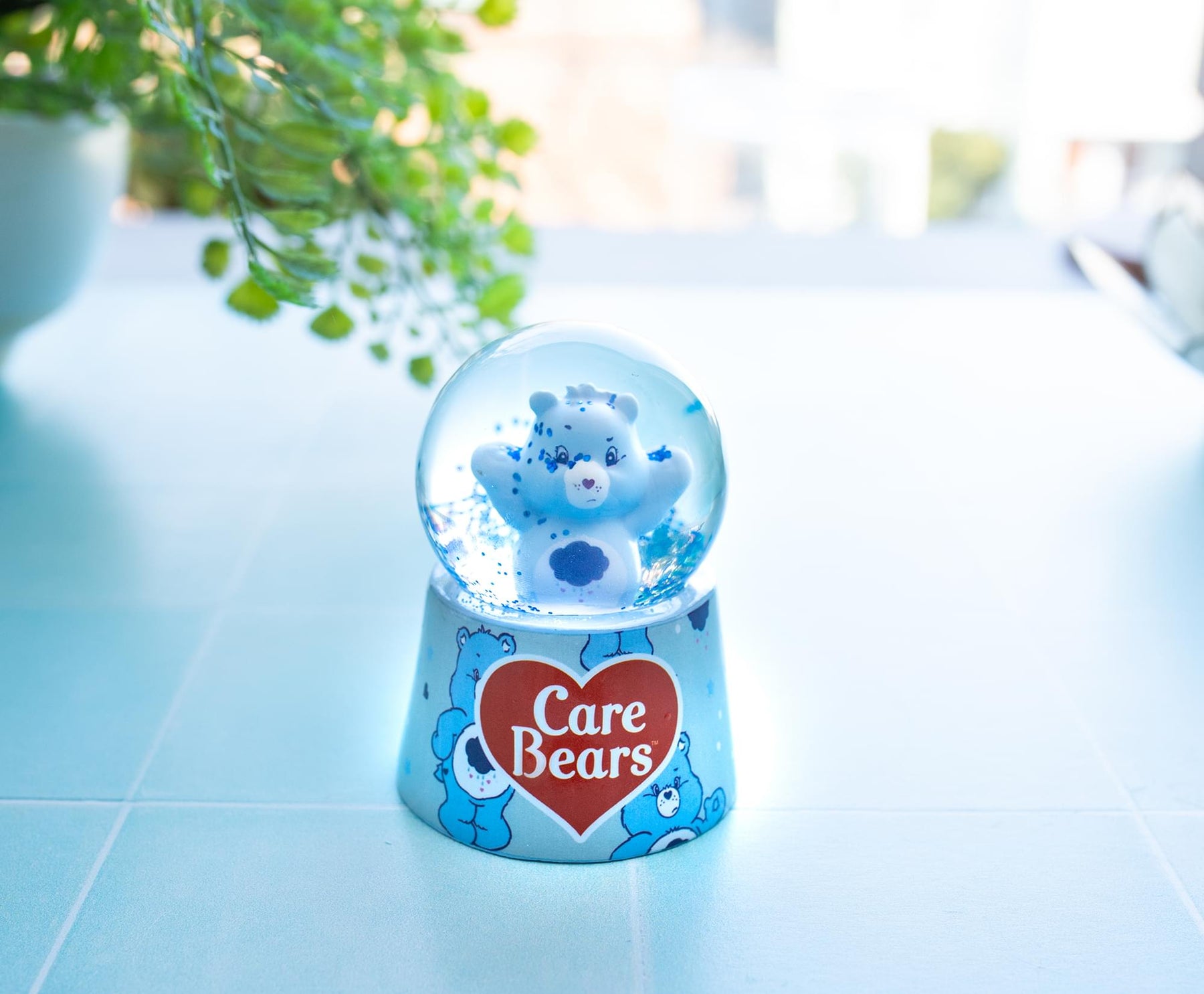 Care Bears Grumpy Bear Mini Light-Up Snow Globe | 3 Inches Tall