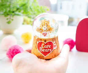 Care Bears Tenderheart Bear Mini Light-Up Snow Globe | 3 Inches Tall